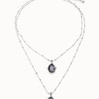 Multi strand necklace with two black oval faceted crystals
